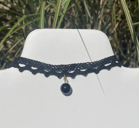 Black scalloped lace choker necklace with hanging ball pendant. Located in Owego, NY